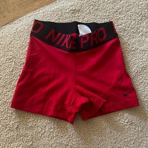 red nike pros